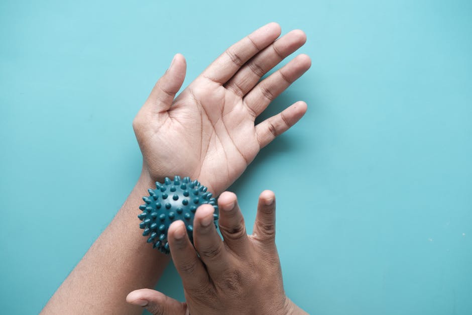Close-up of hands tapping on acupuncture points during stress relief session