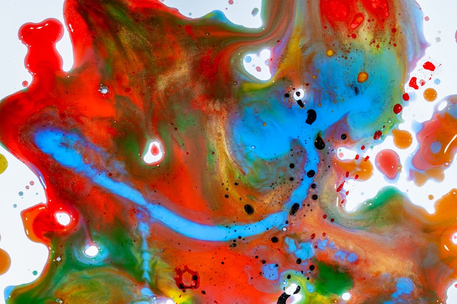 Abstract colorful ink patterns with mirrored symmetry