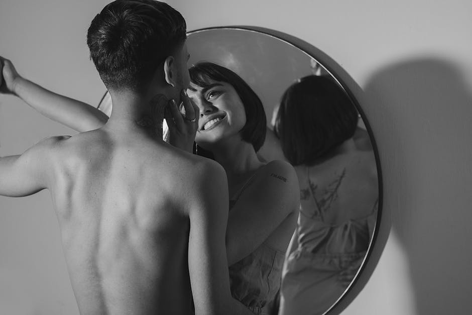 Couple in an intimate but emotionally distant moment, suggesting temporary relief and emptiness