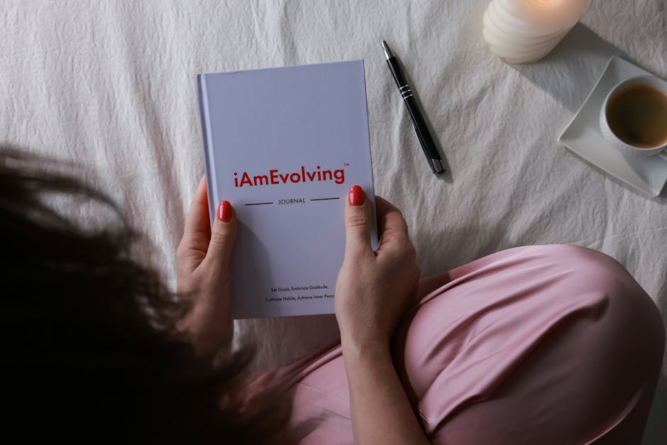Woman writing in a journal with a calm reflective mood
