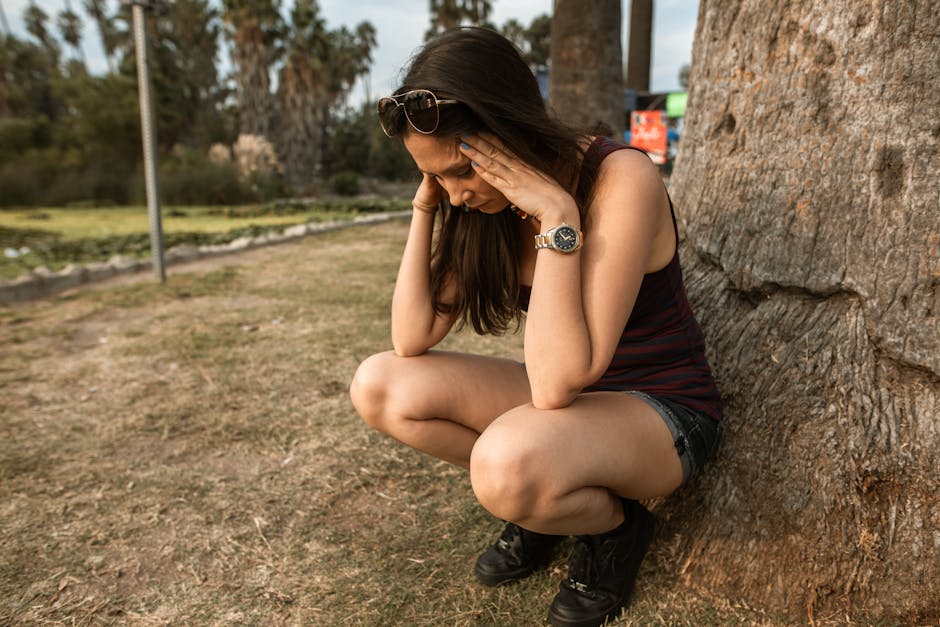 Anxious adult reflecting on stress and low self-esteem