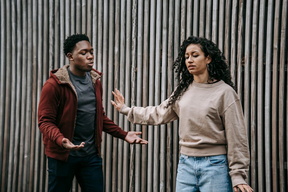Two people in conflict, illustrating injustice and resentment in relationships