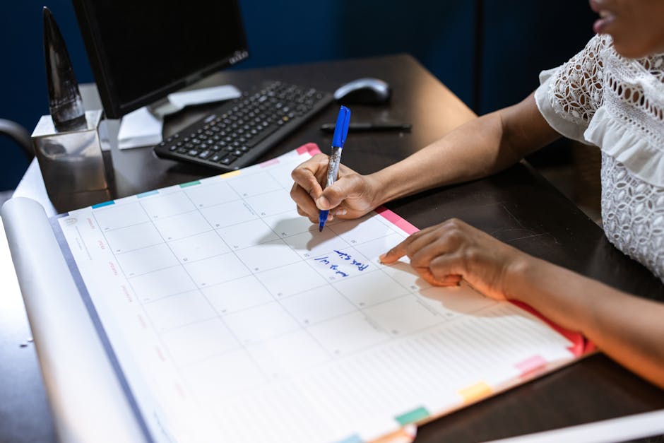 Overwhelmed adult managing paperwork and calendar deadlines