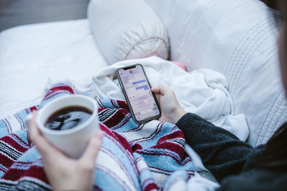 Anxious person checking a phone for a message