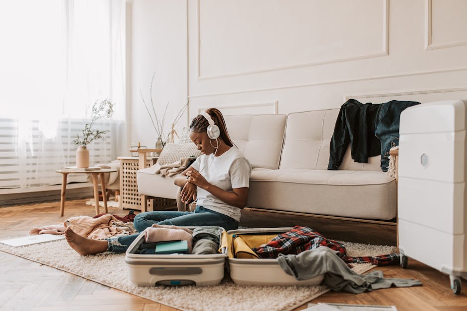 Woman packing a bag to leave an abusive relationship