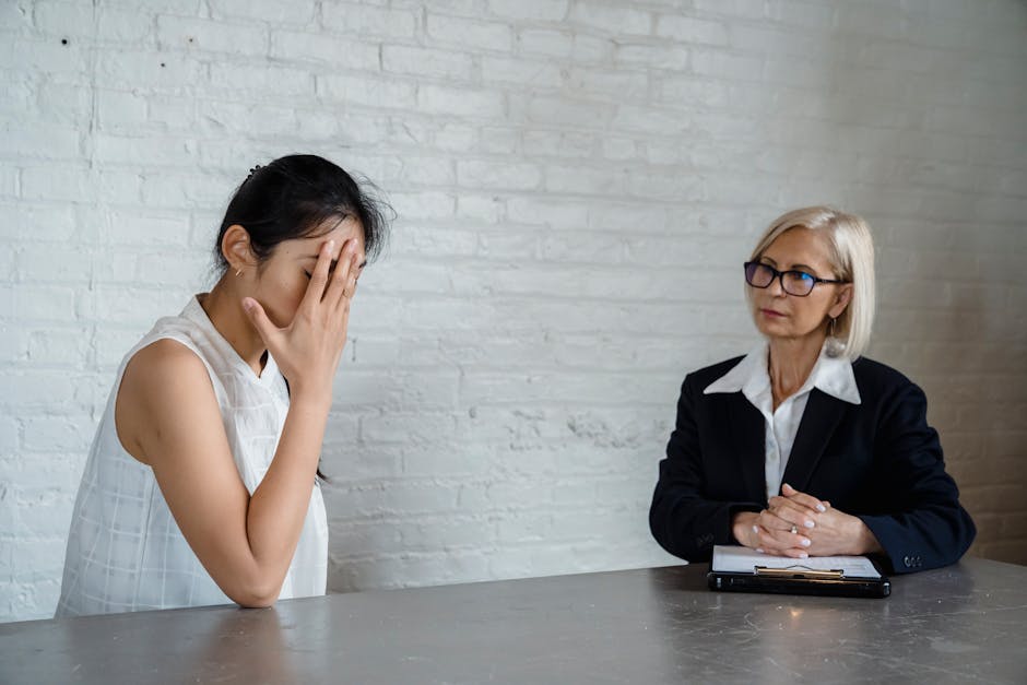 Therapist and patient discussing mental health treatment in a calm office