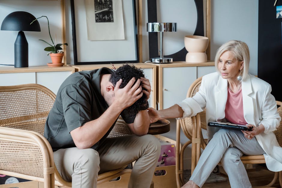 Therapist talking with patient in a calm psychotherapy session