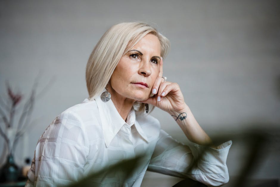 Older adult reflecting alone in a calm environment