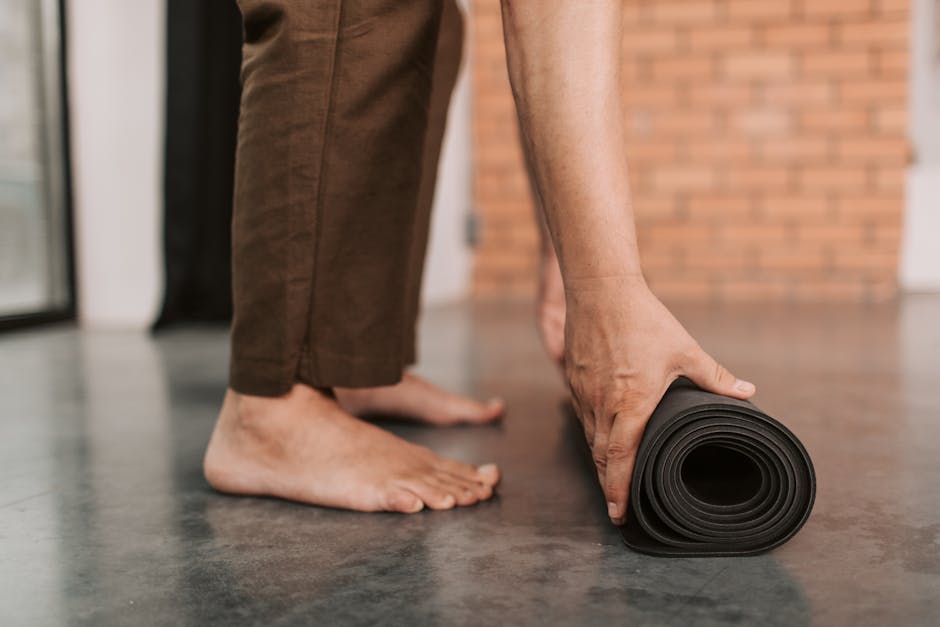 Grounding exercise with feet on the floor and hands holding an object
