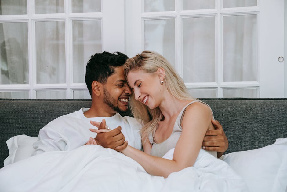 Happy couple laughing together in a casual moment