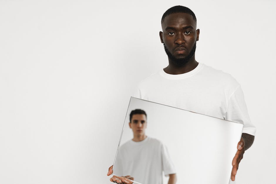 Person looking at their reflection in a mirror with a sense of detachment