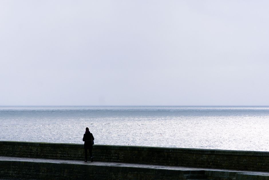 Person reflecting alone after an emotional conversation