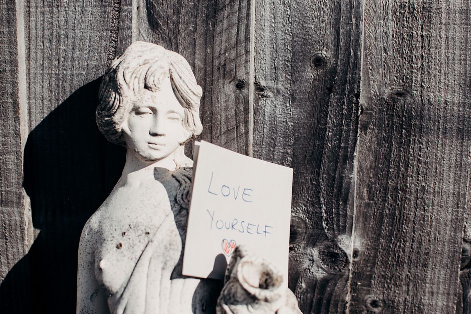 Person reflecting alone on personal boundaries and self-care