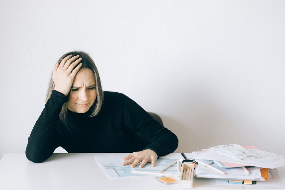 Stressed professional avoiding a challenge at work