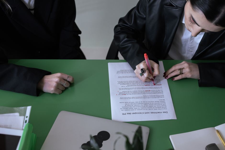 Person reviewing professional credentials and documents