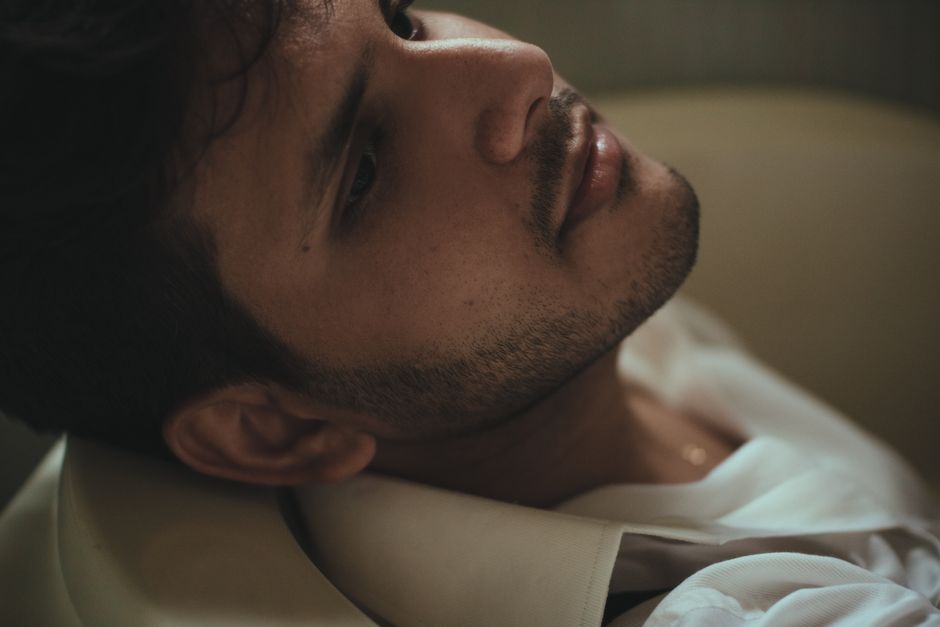 Person thinking deeply with visible inner conflict and rumination