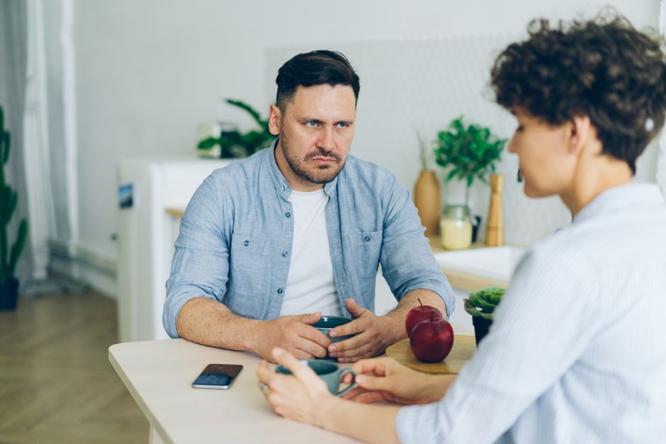 Person setting a boundary in a conversation