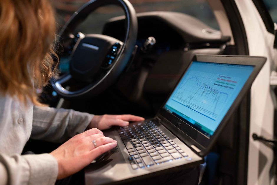 Person analyzing personality test results on a laptop