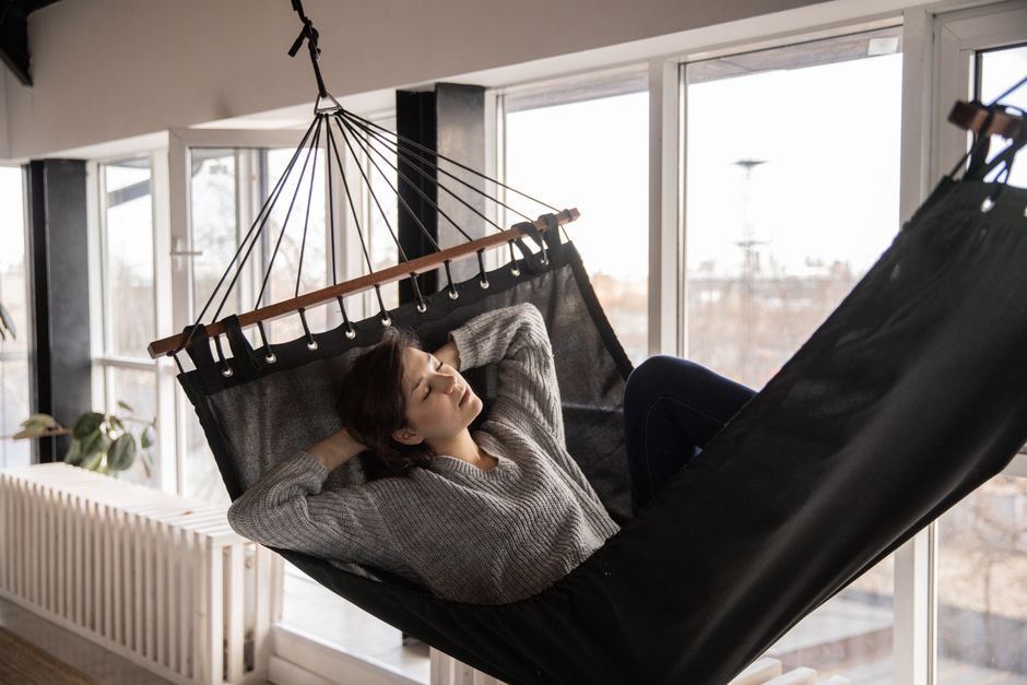 Calm person resting in a peaceful home environment after social exhaustion