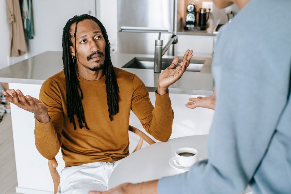 Couple discussing relationship boundaries at home