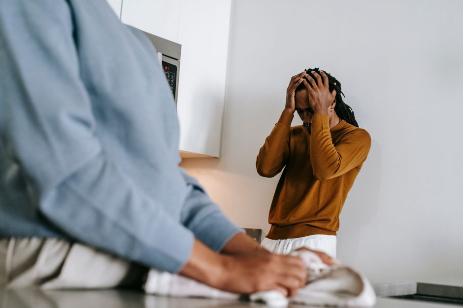 Couple in tense emotional conflict at home