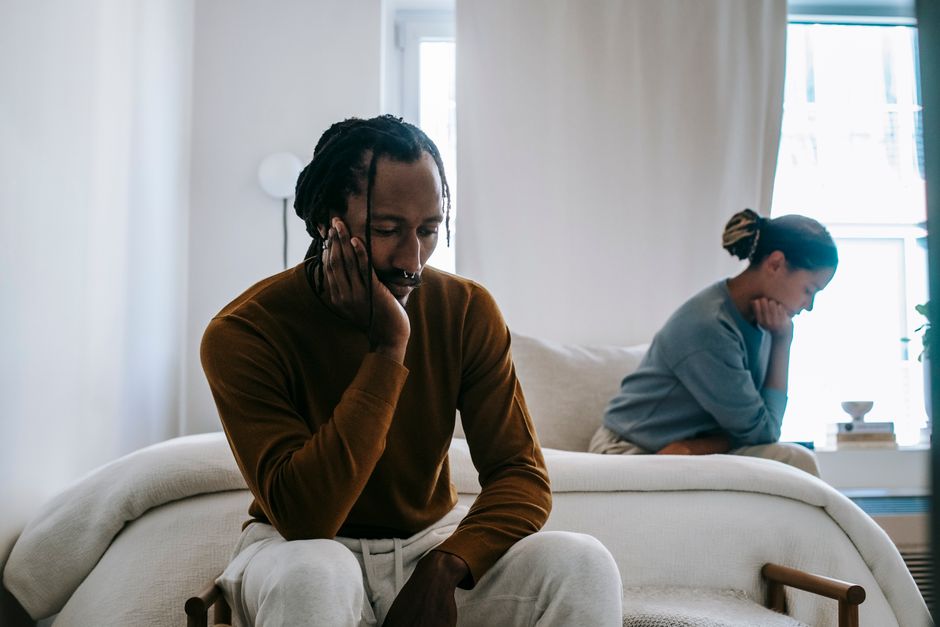 Person looking thoughtful and conflicted about a relationship