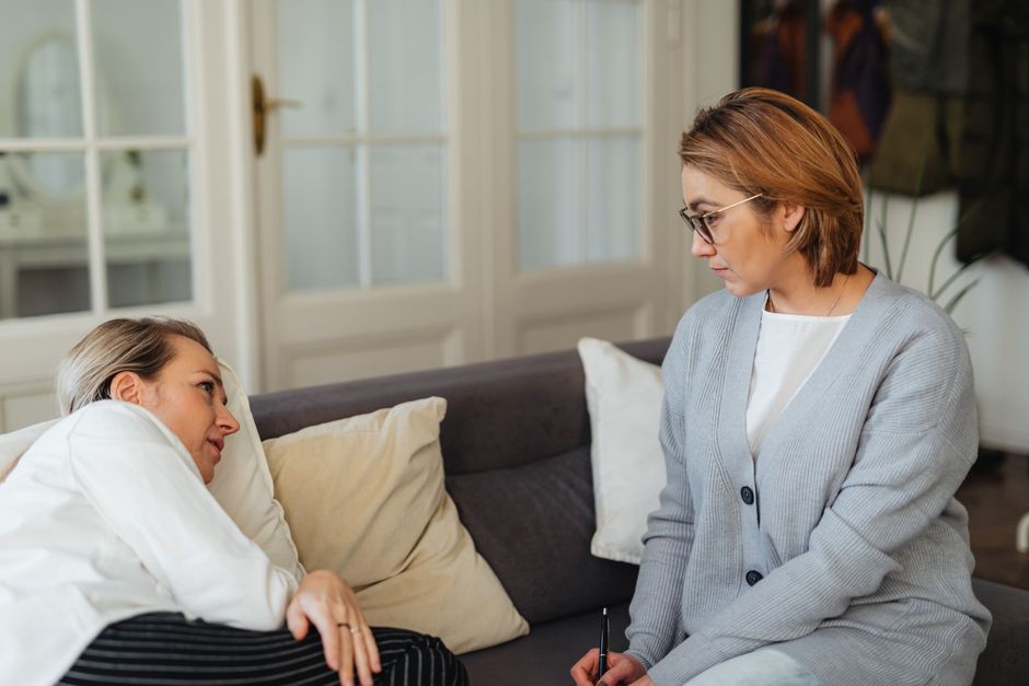 Supportive conversation between two people in a safe setting