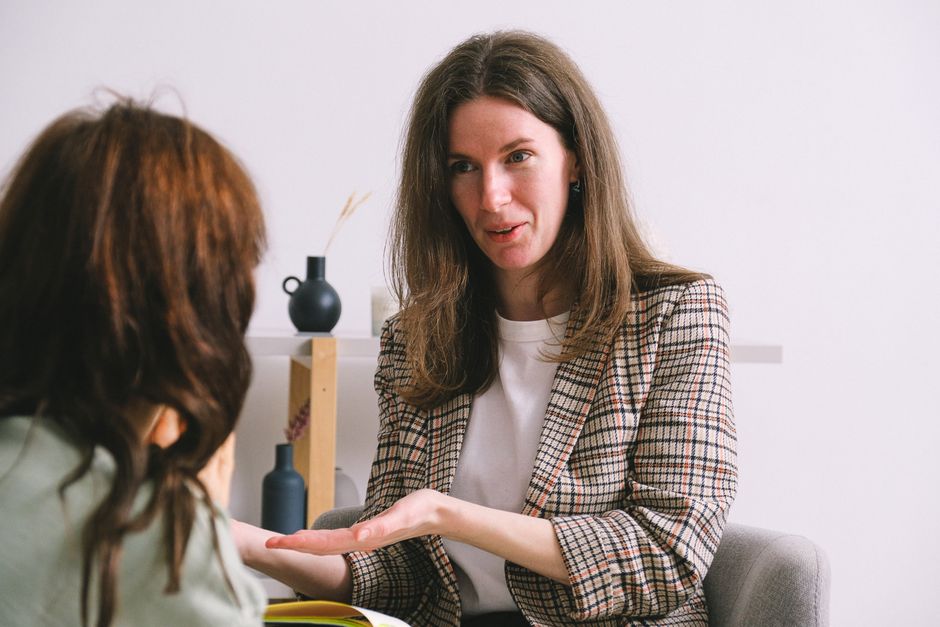 Therapist and patient in a professional consultation room discussing anxiety treatment