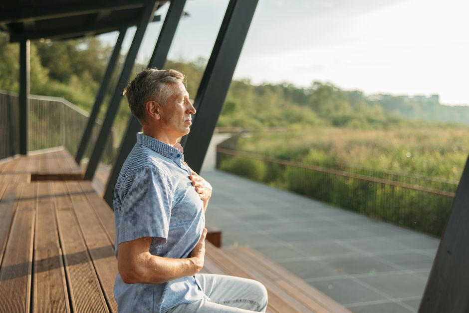 Person practicing calm breathing to manage stress