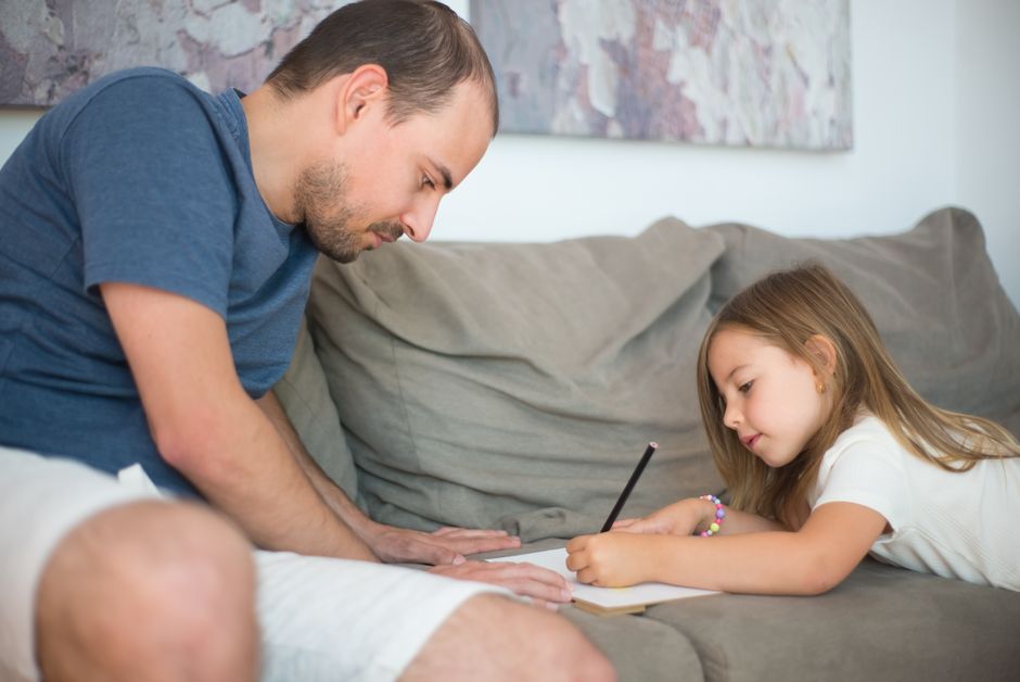 Separated father spending time with daughter on a scheduled visit